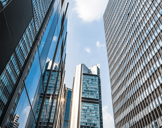 Modern skyscrapers in Florida reflecting sunlight, symbolizing business and commercial insurance landscape.