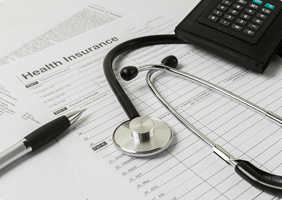 Health insurance paperwork with a stethoscope and pen, symbolizing health insurance processes in Florida.