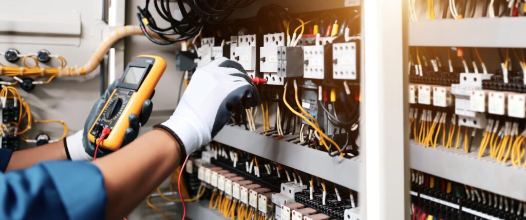 electrician working on electrical equipment