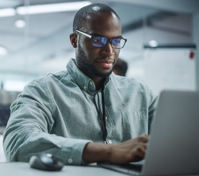 man stopping a cyber attack