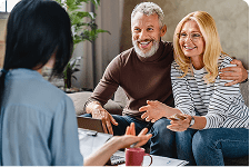 insurance agent talking to couple