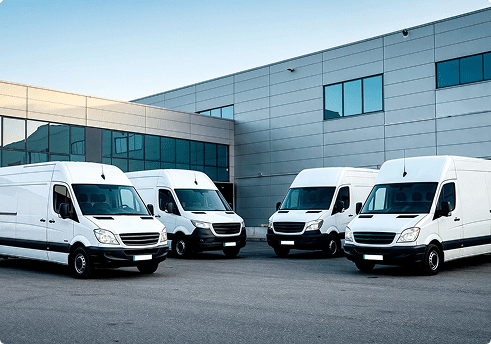 vans parked outside of a business