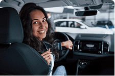 woman look back in car