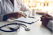 doctor speaking with a patient