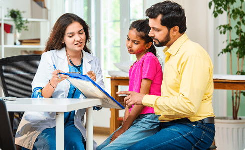 father and daughter at the doctor office