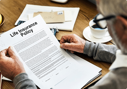 senior reviewing life insyrance policy