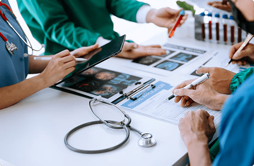 senior couple filling out medicare paperwork