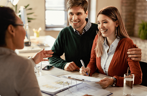husband and wife talking to an insurance agent