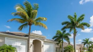Florida home with hurricane shutters under a clear blue sky, symbolizing hurricane protection